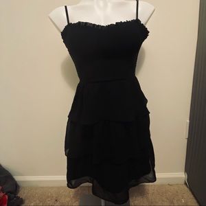 Black ruffled mini dress